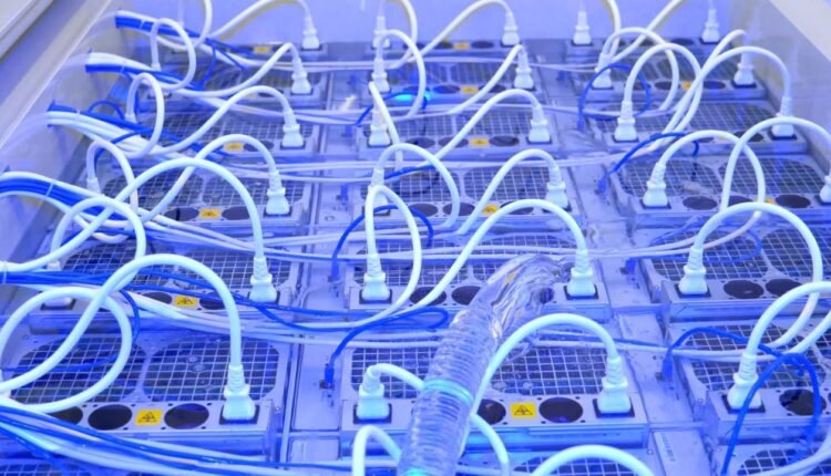 Large Immersion Cooled Crypto Mining Farms to Extract Bitcoin in Middle East Desert